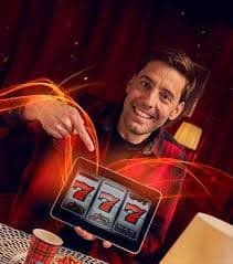 Tampilan permainan slot Golden Toad dengan simbol-simbol bertema emas dan katak di platform ladang jitu
